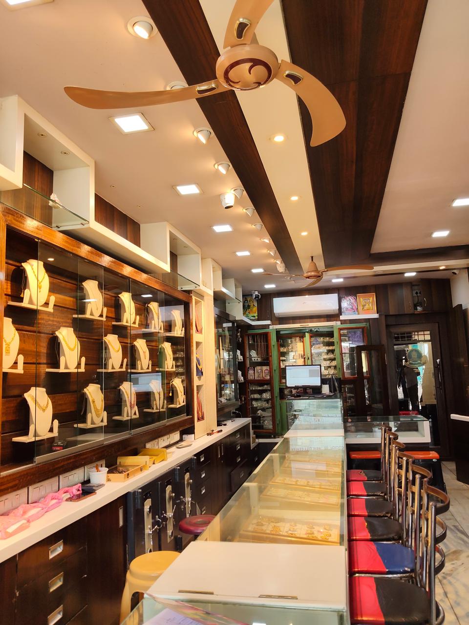 Gold jewellery display counters inside Sri Nageshrao Jewellers showroom